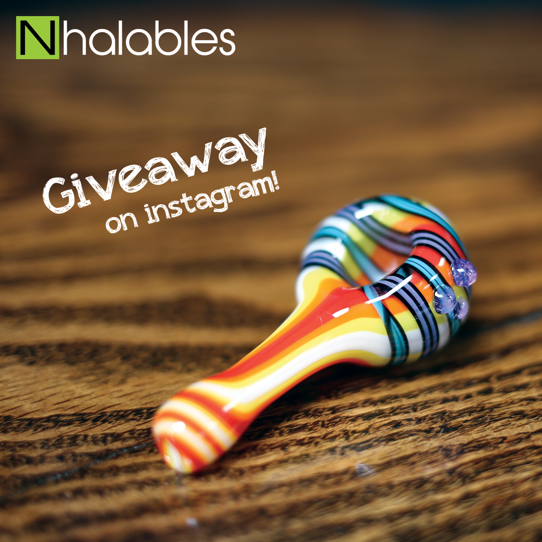 Nhalables Social Post showing a JEM Glass rainbow linework hand pipe sitting on a wooden shelf.