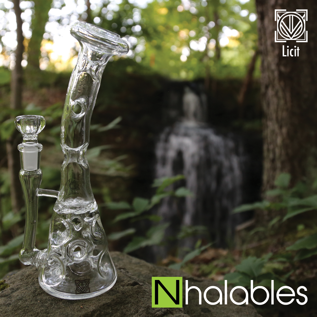 Nhalables Licit Glass (Virginia, USA) Swiss Beaker Waterpipe sitting on rock in the forest in front of a waterfall Near Wadsworth Ohio