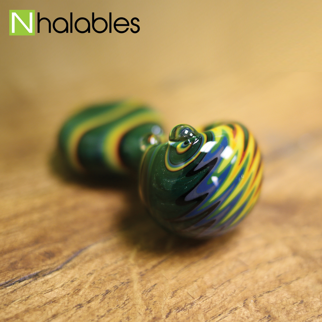 Nhalables Social Post showing the front side of a Alan Balades Handpipe sitting on a wooden shelf.