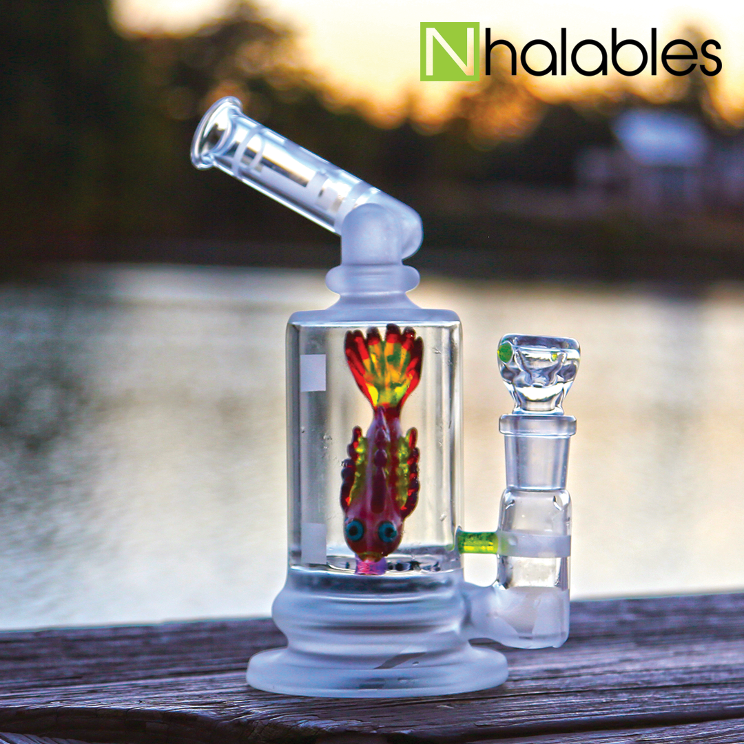 Nhalables Social Post Showing a Fish Jimmie Disc Waterpipe by Arizona Based Artist LQL-Glass