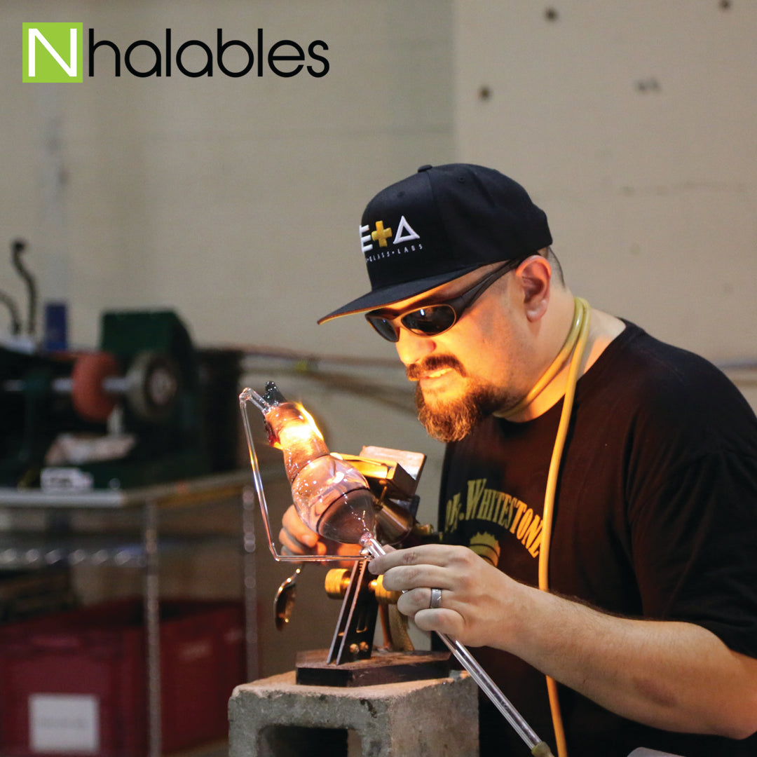 Nhalables Social Post Showing Glass Artist Tito Bern on the torch doing his glass blowing demo at Michigan Glass Project 2016 in Detroit Michigan  